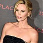 CharlizeTheronDarkPlacesParisPremiere_47.jpg