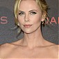 CharlizeTheronDarkPlacesParisPremiere_63.jpg