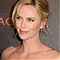 CharlizeTheronDarkPlacesParisPremiere_94.jpg