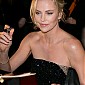 CharlizeTheronDarkPlacesParisPremiere_99_14.jpg
