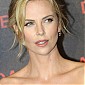 CharlizeTheronDarkPlacesParisPremiere_99_37.jpg