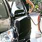 pumpinggasatagasstationinBeverlyHillsJuly13_02.jpg
