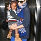 CharlizeandsonarriveLAXairport6janv_10.jpg