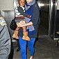 CharlizeandsonarriveLAXairport6janv_12.jpg