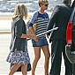 boardsaplanewithhersonandMomattheBurbankAirport_03.jpg