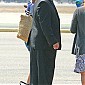 boardsaplanewithhersonandMomattheBurbankAirport_04.jpg