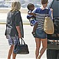 boardsaplanewithhersonandMomattheBurbankAirport_08.jpg