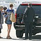 boardsaplanewithhersonandMomattheBurbankAirport_09.jpg