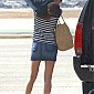 boardsaplanewithhersonandMomattheBurbankAirport_14.jpg