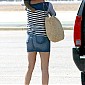 boardsaplanewithhersonandMomattheBurbankAirport_15.jpg