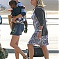 boardsaplanewithhersonandMomattheBurbankAirport_19.jpg