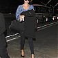 CharlizeTheronArrivesLAXairport_04.jpg