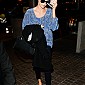 CharlizeTheronArrivesLAXairport_11.jpg