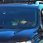 CharlizeTheron_leavinganailsalonwithSean_18.jpg