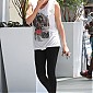 CharlizeTheronStopsbygymworkoutWH_04.jpg