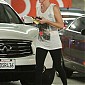 CharlizeTheronStopsbygymworkoutWH_11.jpg