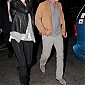 CharlizeandSeanleavingaconcertinLA_02.jpg