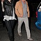 CharlizeandSeanleavingaconcertinLA_04.jpg