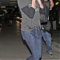 CharlizeTheronarrivesLAX_005.JPG