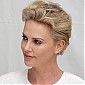 CharlizeTheron_AMillionWaysToDieInTheWestpressconference_01.jpg